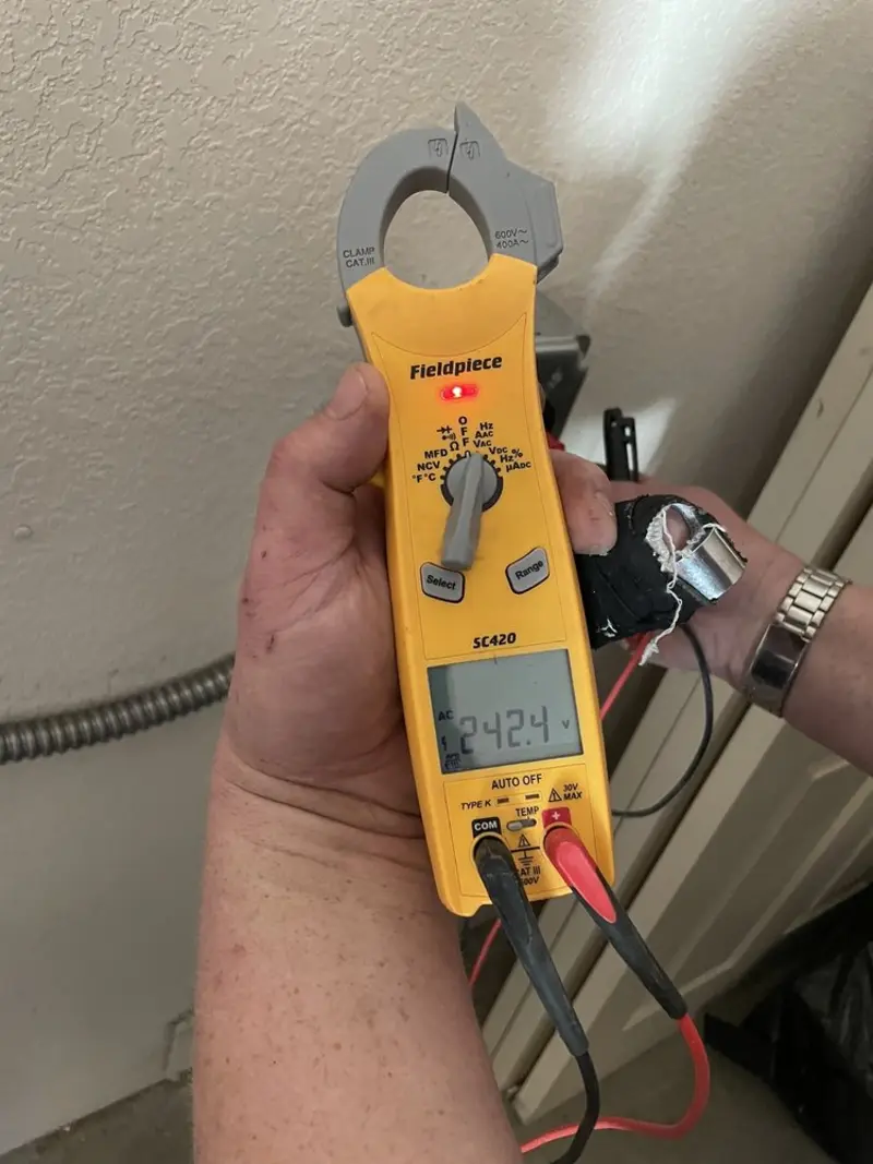 Voltage testing with clamp meter during Generator Installation in Emporia